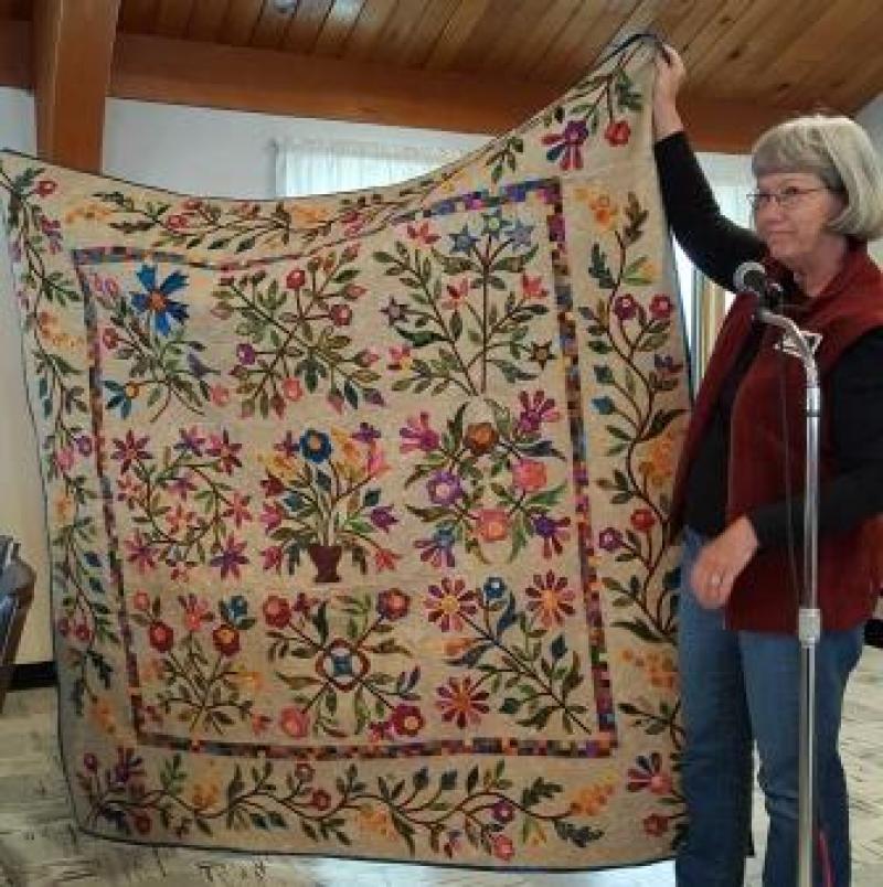Kathy S has completed an applique quilt called Spring Bouquets